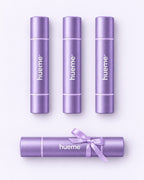 Three hueme sticks plus one extra stick tied with a lilac ribbon