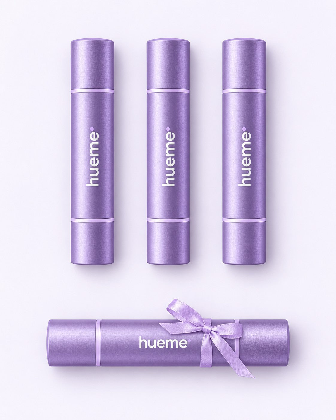 Three hueme sticks plus one extra stick tied with a lilac ribbon